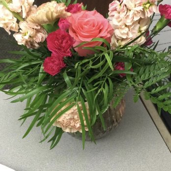 Floral Concepts - Mostly green, with a few flowers, that look like they've seen better days. - Florists Near Me - Addison, Texas