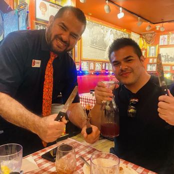 Buca di Beppo Italian Restaurant - Moises & my brother in-law posing for the cameras. Phenomenal service! - Italian Near Me - Universal City, California
