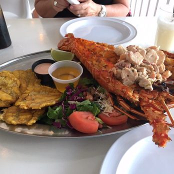 La Parrilla - Langosta Fresca A La Parilla ( Stuffed Lobster with seafood) - Latin American Near Me - Luquillo, Puerto Rico La Parrilla - Langosta Fresca A La Parilla ( Stuffed Lobster with seafood) - Latin American Near Me - Luquillo, Puerto Rico
