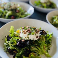 Private Chef Bonnie - Spring salad with baby heirloom tomatoes, sunflower seeds Shaved kale & pecan crusted goat cheese with a lemon herb vinaigrette