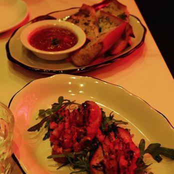 Uncle Dom's Italian Kitchen - Bruschetta alla pomodoro (7.5/10) -- savory grilled crostini with fresh tomato, and a drizzle of balsamic over peppery arugula. Delicious - Italian Near Me - Seattle, Washington Uncle Dom's Italian Kitchen - Bruschetta alla pomodoro (7.5/10) -- savory grilled crostini with fresh tomato, and a drizzle of balsamic over peppery arugula. Delicious - Italian Near Me - Seattle, Washington