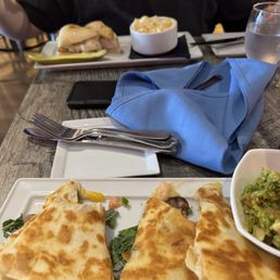 Steak quesadilla. Macaroni and cheese and grilled chicken on ciabatta bread. Steak quesadilla. Macaroni and cheese and grilled chicken on ciabatta bread.
