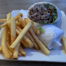 Combo Gyro Wrap - Lamb-Beef and Chicken Gyro with Garlic Sauce, Salad, and Tahini Sauce wrapped in Lavash Bread