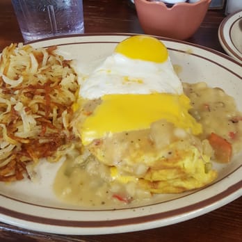 Cowboy Cafe - That ham and cheese omelet topped with green chile sauce, cheese and a fried egg! - Breakfast & Brunch Near Me - Roswell, New Mexico