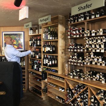 The Classic Wineseller - a man in a wine shop - Beer, Wine & Spirits Near Me - Waynesville, North Carolina
