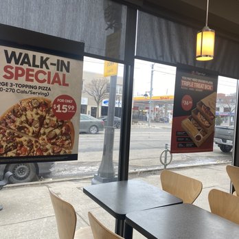 Pizza Hut - tables and chairs in front of a window - Pizza Near Me - Etobicoke, Ontario Pizza Hut - tables and chairs in front of a window - Pizza Near Me - Etobicoke, Ontario