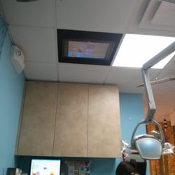 Adult & Pediatric Dental Studio - Tv's on the ceiling !! How cool is that?!?! :-) loved it