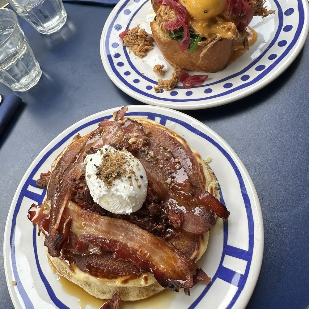 Sexy Benny Egg (back) and Pancakes Bacon & Poached Egg (front). Sexy Benny Egg (back) and Pancakes Bacon & Poached Egg (front).