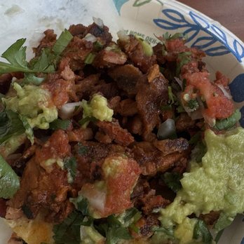 Taqueria Tijuana - Adobado taco, topped with onion, cilantro, a red salsa and avocado - Food Trucks Near Me - Oklahoma City, Oklahoma Taqueria Tijuana - Adobado taco, topped with onion, cilantro, a red salsa and avocado - Food Trucks Near Me - Oklahoma City, Oklahoma