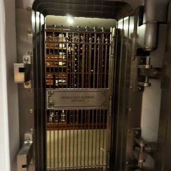 Stock & Bond - Old vault with fancy bottles behind glass - Steakhouses Near Me - Minneapolis, Minnesota Stock & Bond - Old vault with fancy bottles behind glass - Steakhouses Near Me - Minneapolis, Minnesota