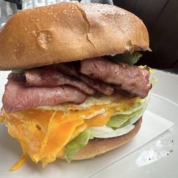 Tops breakfast sandwich - turkey bacon, avocado, lettuce, and the freshest eggs you'll ever have. On brioche.