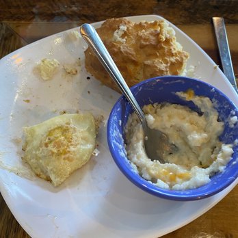 Biscuit Head - Fried egg, biscuit and pimento cheese grits. - Breakfast & Brunch Near Me - Greenville, South Carolina