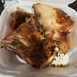 A whole dry and overcooked chicken.