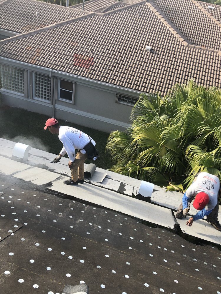 Slide of Rocky's Roofing