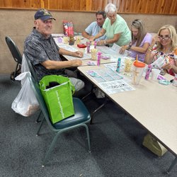 This is a photo of Marlene setting up. The page is of the bingo game. We never would've been able to do it without her.