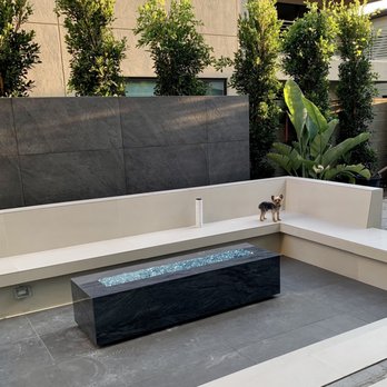 Aquagreen Pool & Landscapes - Our dog enjoys our yard the most. - Pool & Hot Tub Service Near Me