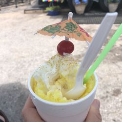 Parrotice - Pineapple/Mango with whipped cream.