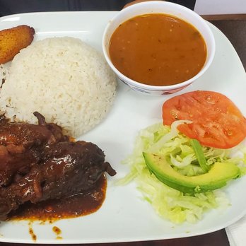 Juanita's Bakery & Grill - Stew Chicken - Latin American Near Me - Charlotte, North Carolina
