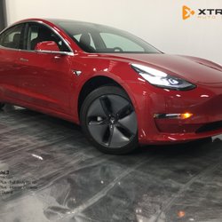 Xtreme Auto Details - 2018 Tesla 3 fully wrapped in Xpel Ultimate Plus after single stage paint correction.
