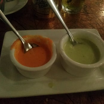 El Rocoto - Spread butter on your bread dip it in the green and then in the orange ,trust me is addicting. - Peruvian Near Me - Cerritos, California