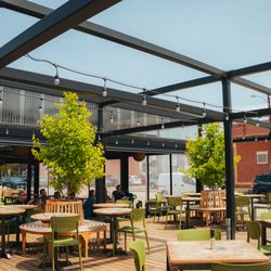 Denver Beer Co. Littleton - Guests enjoy Colorado sunshine and craft beer on the spacious patio at Denver Beer Co. Littleton.
