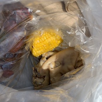 Cajunland Seafood - Pig foot and corn - Cajun/Creole Near Me - Gretna, Louisiana
