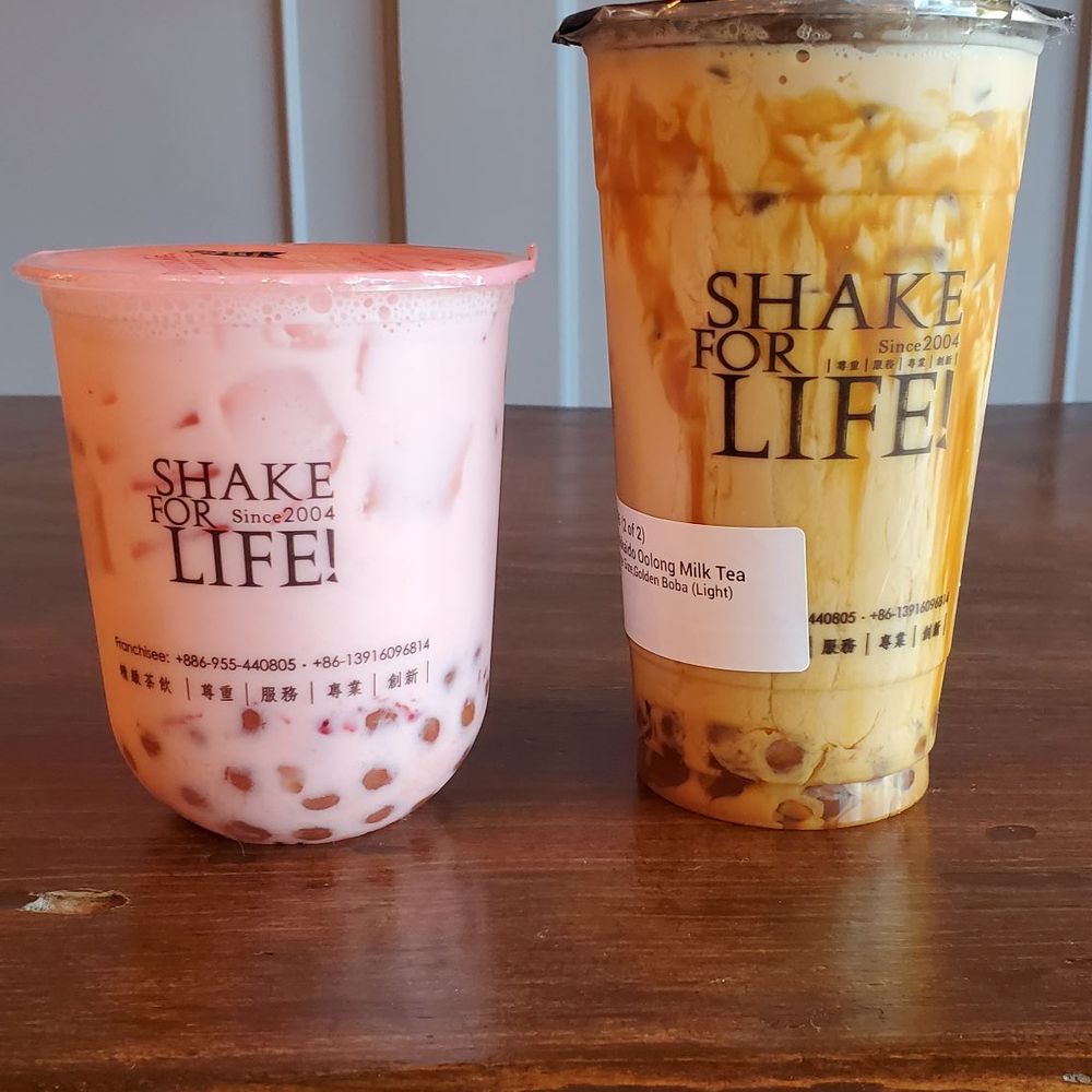 Teatopia - Strawberry milkita (tea-free milky drink) and Hokkaido oolong milk tea with boba. - Bubble Tea Near Me - Long Beach, California