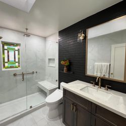 The Bath Studio - Discover the perfect blend of modern elegance and family functionality in this newly remodeled bath.