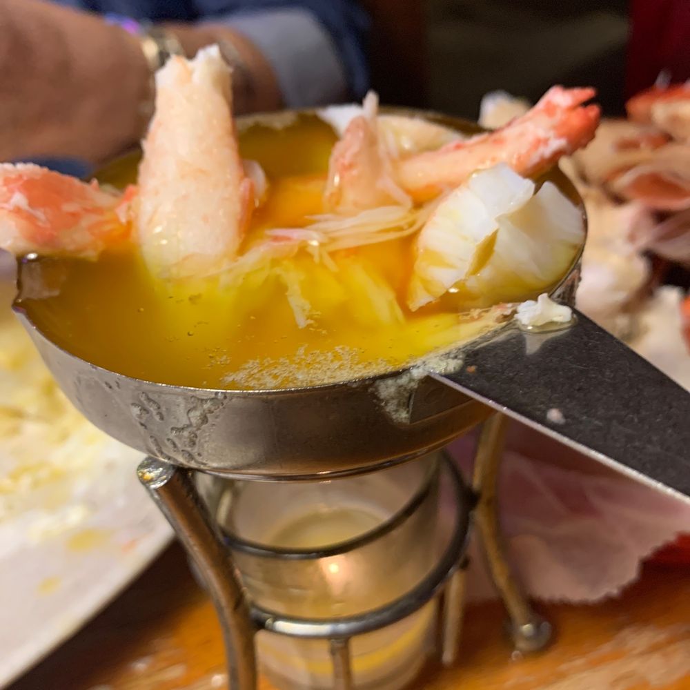 Midland Inn - a person holding a spoon full of shrimp - Bars Near Me - Murphysboro, Illinois Midland Inn - a person holding a spoon full of shrimp - Bars Near Me - Murphysboro, Illinois