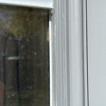 CGarcia Renovation - Paint bleeding on glass. Not a pro job. - General Contractors Near Me