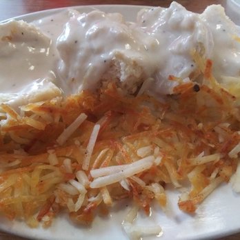 Texan Kitchen - Tiny Tim, no sausage. 2 Open Faced biscuits, sub pepper gravy and hash browns. - American Near Me - Euless, Texas