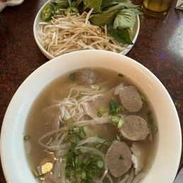 Pho with ribeye, meatballs and garnishes Pho with ribeye, meatballs and garnishes
