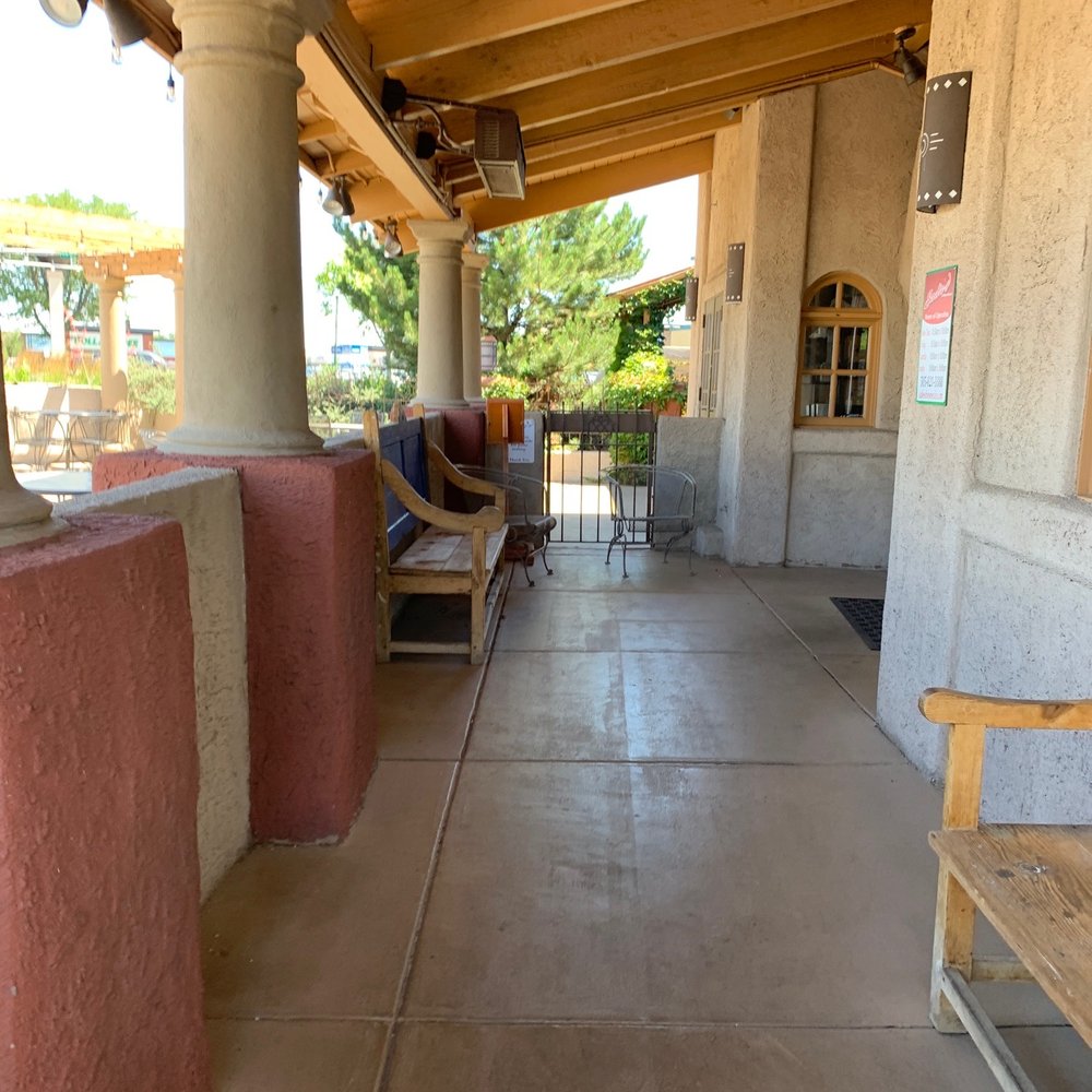 Sadie's - a porch with a bench and chairs - New Mexican Cuisine Near Me - Albuquerque, New Mexico Sadie's - a porch with a bench and chairs - New Mexican Cuisine Near Me - Albuquerque, New Mexico