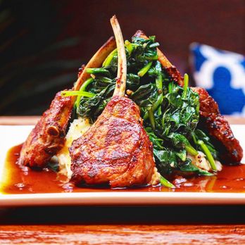 Sahara East - a plate of lamb chops and spinach - Middle Eastern Near Me - New York, New York Sahara East - a plate of lamb chops and spinach - Middle Eastern Near Me - New York, New York
