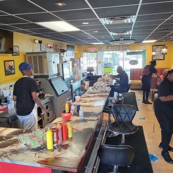 Derry's Restaurant - a group of people in a restaurant - Breakfast & Brunch Near Me - Hollywood, Florida Derry's Restaurant - a group of people in a restaurant - Breakfast & Brunch Near Me - Hollywood, Florida