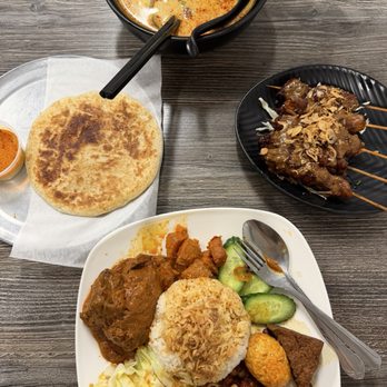 Borneo Eatery - Roti Prata Nasi Lemak (Beef Rendang)Singapore Laksa Chicken Satay - Indonesian Near Me - Alhambra, California Borneo Eatery - Roti Prata Nasi Lemak (Beef Rendang)Singapore Laksa Chicken Satay - Indonesian Near Me - Alhambra, California