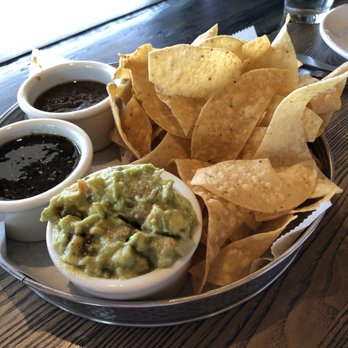 Ghost Ranch - Our $9 chips, salsa and guacamole plate. - Cocktail Bars Near Me - Tempe, Arizona Ghost Ranch - Our $9 chips, salsa and guacamole plate. - Cocktail Bars Near Me - Tempe, Arizona