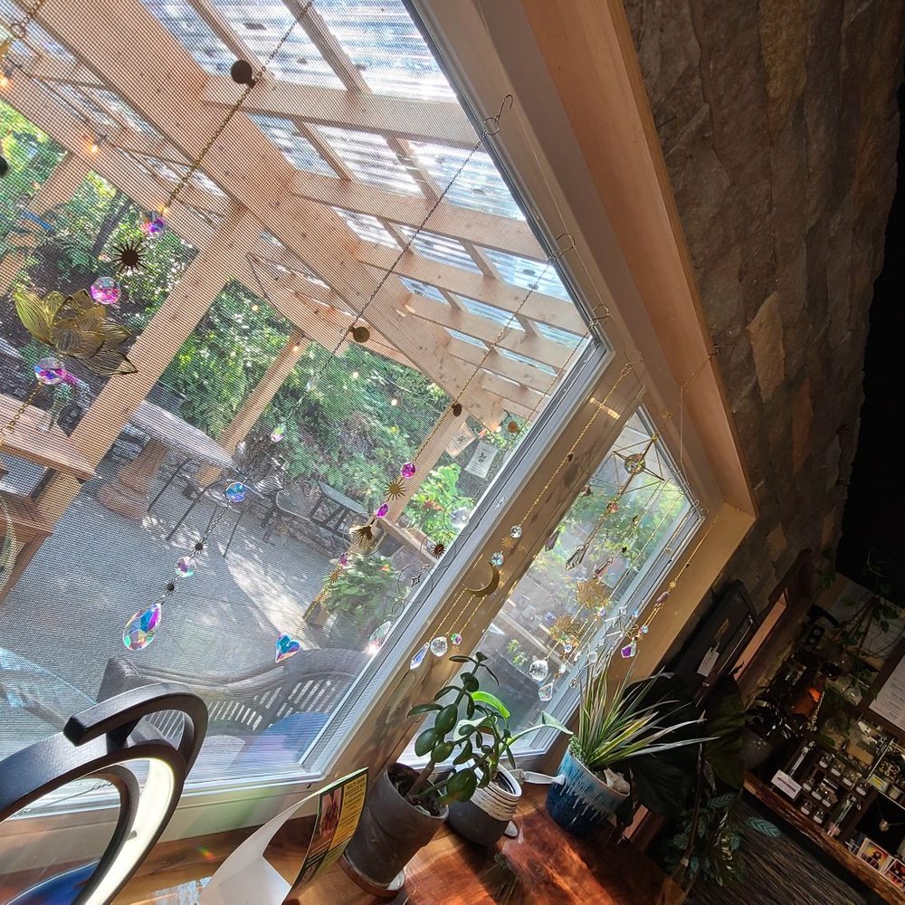 Soul Cafe - View of the outdoor eating area and sun catchers for sale - Cafes Near Me - Olympia, Washington Soul Cafe - View of the outdoor eating area and sun catchers for sale - Cafes Near Me - Olympia, Washington