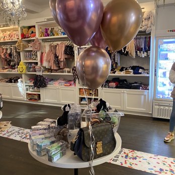 A La Mode Shoppe - a display of baby goods - Ice Cream & Frozen Yogurt Near Me - New York, New York A La Mode Shoppe - a display of baby goods - Ice Cream & Frozen Yogurt Near Me - New York, New York