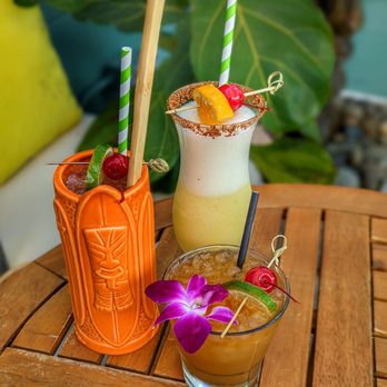 The Luau - two cocktails on a table - Tiki Bars Near Me - San Diego, California The Luau - two cocktails on a table - Tiki Bars Near Me - San Diego, California