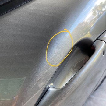 The dent Trooper - Before. 2 year old ding. - Mobile Dent Repair Near Me