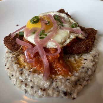 Foreign & Domestic - berkshire pork, grits, tomato gravy, &sunny eggs - New American Near Me - Austin, Texas Foreign & Domestic - berkshire pork, grits, tomato gravy, &sunny eggs - New American Near Me - Austin, Texas