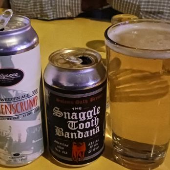 The Moonlighter - L - R: Pollyanna Hefe Weissen, Snaggle Tooth Bandana, and Surly Helles Lager - Burgers Near Me - Chicago, Illinois The Moonlighter - L - R: Pollyanna Hefe Weissen, Snaggle Tooth Bandana, and Surly Helles Lager - Burgers Near Me - Chicago, Illinois