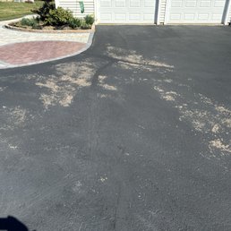 Driveway with SealPro black top coating loss