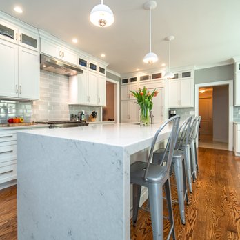 Kitchen Living - This island is the heart of the home, but a true workhorse indeed. It houses a microwave, dishwasher, double sink, trash can, and seats 4! - Kitchen & Bath Near Me - Marlborough, Connecticut