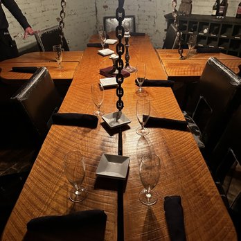 Father John's Brewing Company - a long table with wine glasses on it - Venues & Event Spaces Near Me - Bryan, Ohio