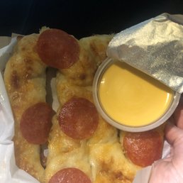 Pepperoni pretzel with cheese sauce, my favorite! Pepperoni pretzel with cheese sauce, my favorite!