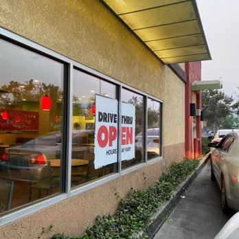 Del Taco - a drive thru sign in a window - Fast Food Near Me - Tulare, California Del Taco - a drive thru sign in a window - Fast Food Near Me - Tulare, California