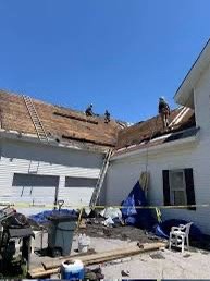 Slide of Archie's Roofing & Construction