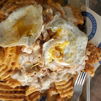 Treylor Park - Treylor brunch nachos "Smothered" in gravy - New American Near Me - Ponte Vedra, Florida Treylor Park - Treylor brunch nachos "Smothered" in gravy - New American Near Me - Ponte Vedra, Florida